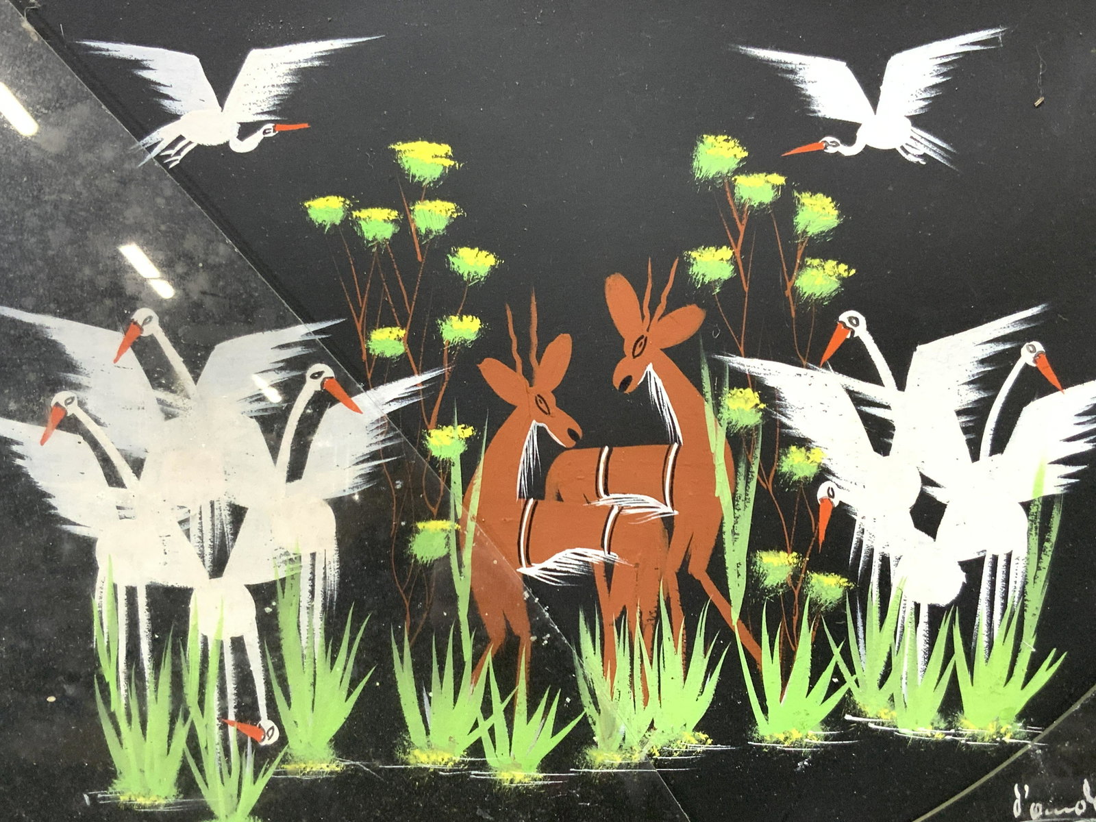 Signed Deer & Cranes Folk Art Painting: Signed on lower right corner in white, illegibly Depicts white cranes with amongst high grass along with a pair of deer. Framed in brown toned wooden frame with off white mat board. Approximately 13.7
