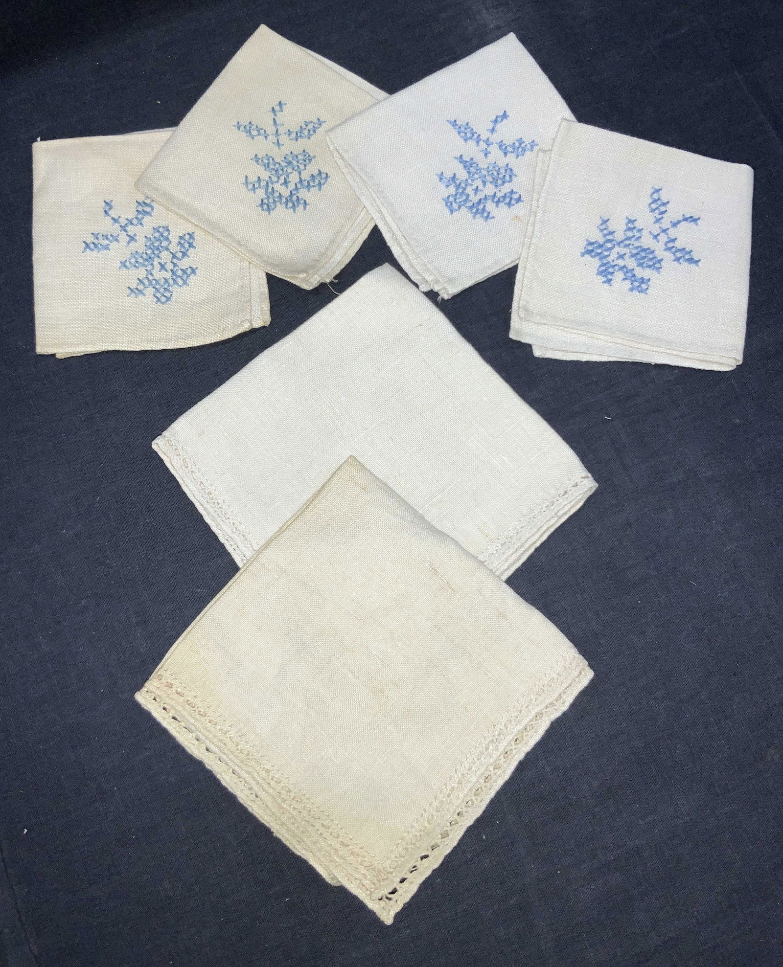 Set 6 Assorted Embroidered & Crochet Handkerchiefs: Set of 6 assorted handkerchiefs. 4 linens with blue embroidery on corners, at 7.5 x 8 inches. And 2 tan toned linens with stitched edges, approximately 11 x 10 inches. Evident blemishes to linens due