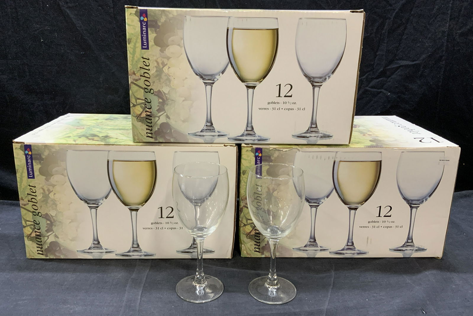 LUMINARC Nuance Glass Goblet 36 Pieces in Boxes: LUMINARC Nuance glass goblets. Like New in original boxes, some surface wear consistent with exposure. Measure approx. 3 inches wide, 7.25 inches tall. LUMINARC, goblet, Glass goblet, stemware, wine g