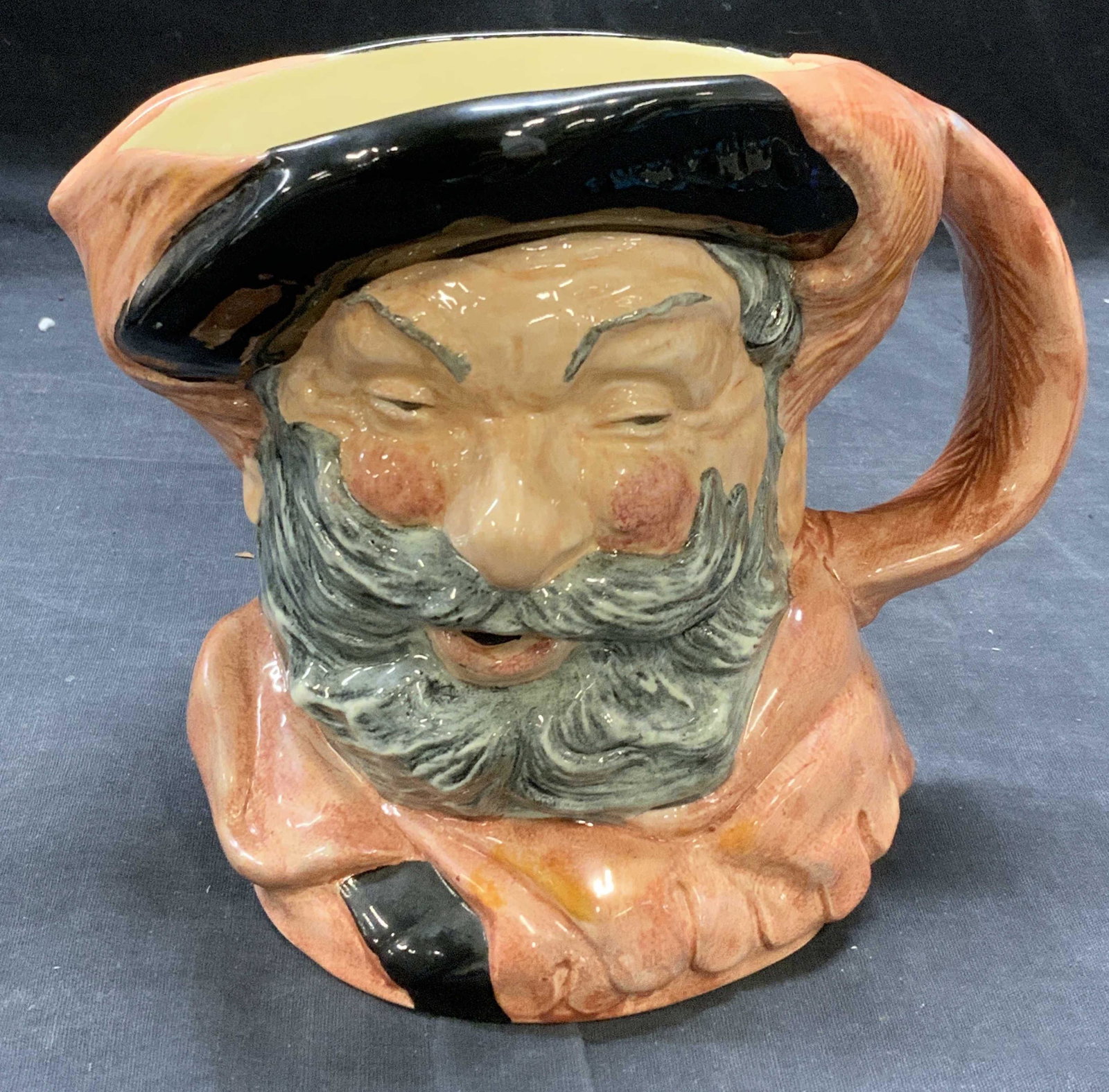 Royal DOULTON Ceramic Falstaff Toby Jug England: Vintage Royal DOULTON ceramic Toby jug. Falstaff. Trademarked to underside. Measures approx. 7.5 x 5.5 x 6 inches. Some surface wear consistent with exposure. Royal DOULTON, royal DOULTON jug, royal D