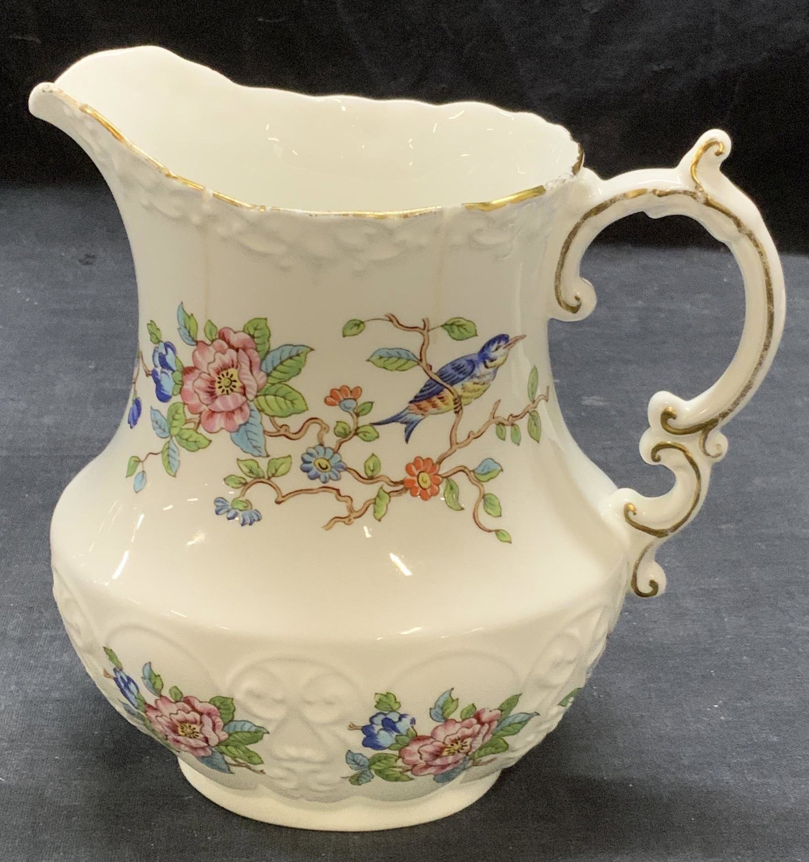 AYNSLEY Pembroke Fine China Pitcher: AYNSLEY Lembroke pattern fine English bone china pitcher with floral motif. Trademarked to underside. Reproduction of an 18th century design. Some surface wear including hairline cracks observed. Meas