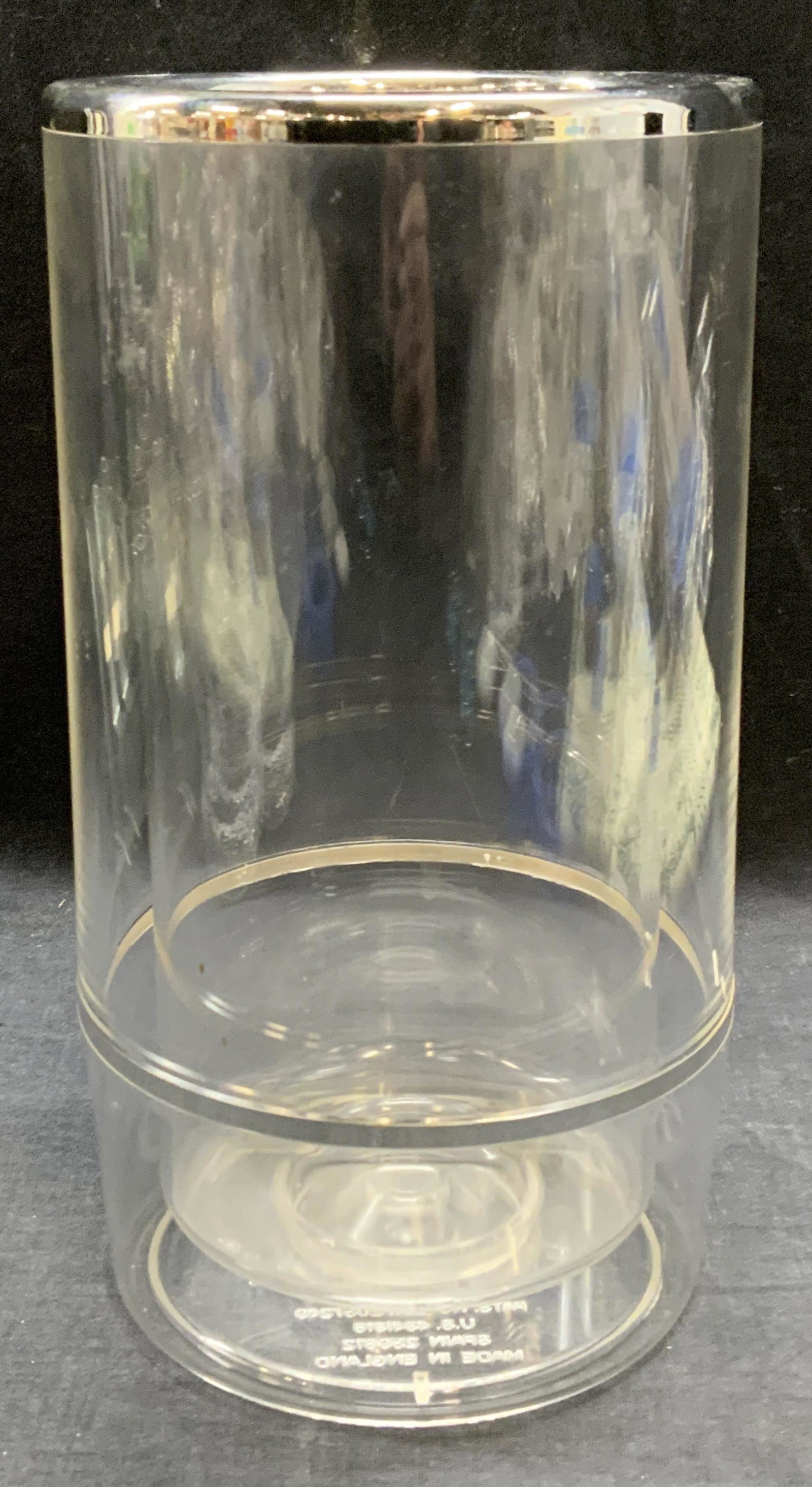 Spong ViniCool Wine Bottle Cooler, England: Spong ViniCool acrylic wine bottle cooler. Made in England. Trademarked to underside. Some surface wear consistent with exposure. Measures approx. 5 x 9 inches. Spong, ViniCool, Spong wine cooler, Vin