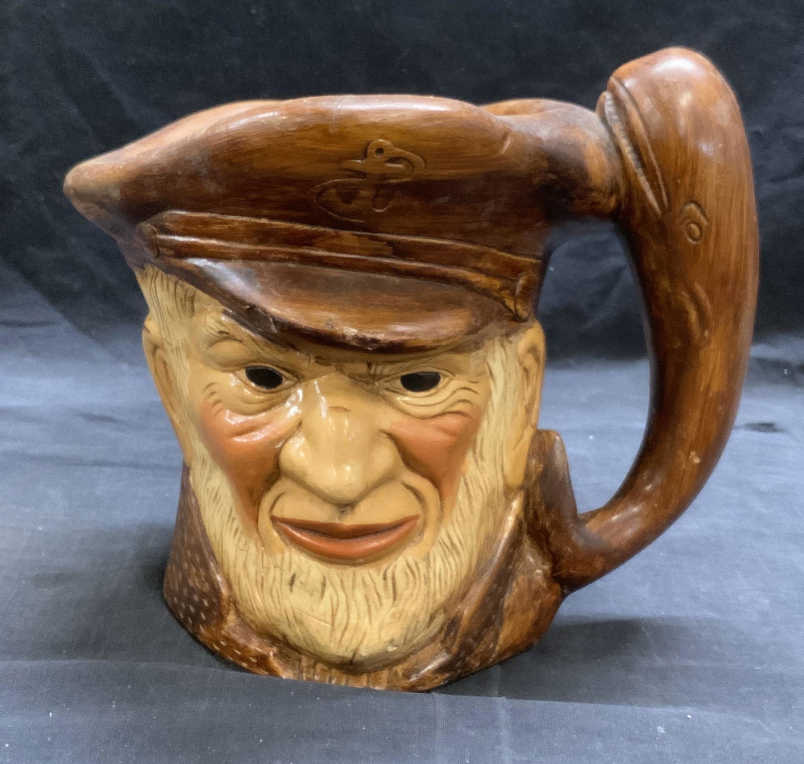 Vintage XL Sea Captain & Whale Figural Jug: Vintage XL sea captain and whale figural ceramic jug. Some surface wear consistent with exposure. Measures approx. 9 x 7 x 8 inches. Ceramic jug, vintage jug, figural jug, collectibles, Moby dick jug,