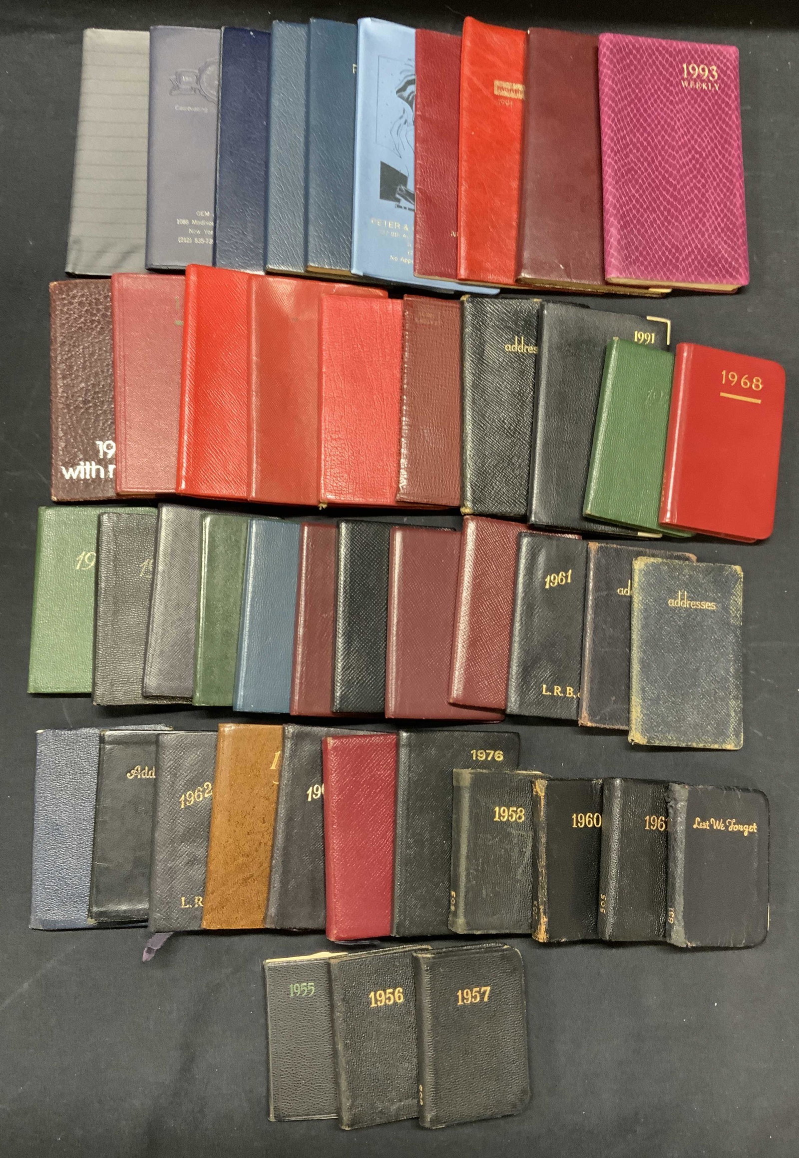 Group 46 Vintage Diaries, Planners, Calendars: Group lot of 46 vintage diaries, planners, and calendars. All pieces have writing on pages and wear to materials consistent with exposure. Largest measures approx. 6 1/8 x 3.5 inches. Dates range from