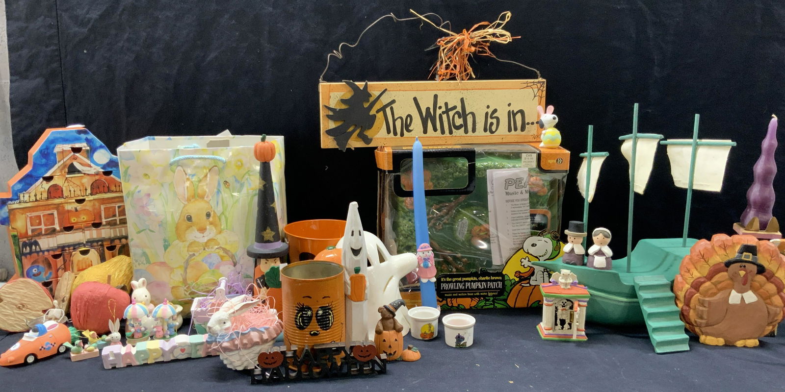 100 + Easter, Halloween & Thanksgiving Accessories: Group lot of 100 + holiday accessories. Filled with Halloween signs, buckets and cans painted to resemble pumpkins, ghost candle holders and A great pumpkin Charlie Brown Peanuts Prowling Pumpkin Patc