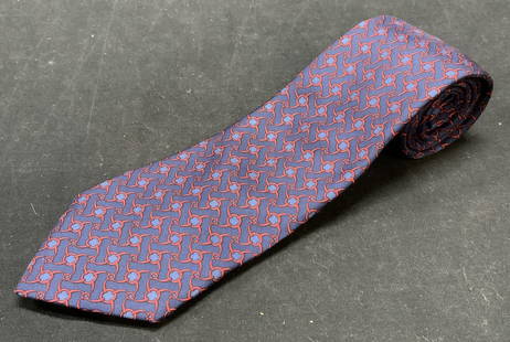 Hermes Blue Patterned Silk Tie, France: Herme blue and red patterned silk tie. Made in France. Gently worn, some discoloration observed. Designer label to fabric. Measures approx. 58.25 inches long. Hermes, Hermes tie, mens luxury tie, mens