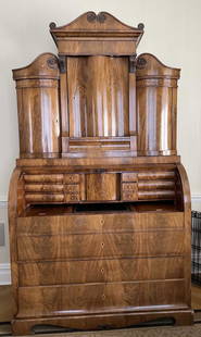 BIEDERMEIER Antique Flame Mahogany Grand Secretary: 19th century Biedermeier flame mahogany 2 piece secretary with a top decorative crest. A base ending on a o-gee style feet, with a top high add-on unit. There are three lower drawers on the base and a