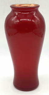 Antique L. C. Tiffany Red Favrile Glass Vase: Antique red iridescent Favrile glass Louis Comfort Tiffany vase. Signed L. C. Tiffany - Favrile, 404 V with partial paper stamp to underside. Measures approx. 3.75 x 7.75 inches. Surface wear consiste