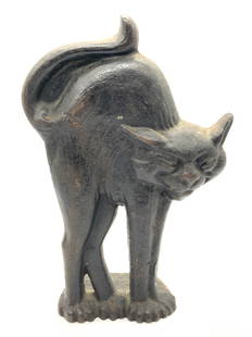 Antique Cast Iron Scared Cat Door Stop: Marked on 273 Depicts a black cat with arched back in a scared position Approximately 10 inches tall and 4.24 inch wide base. Evident wearing to paint on iron. Antique door stop, iron door stop, antiq