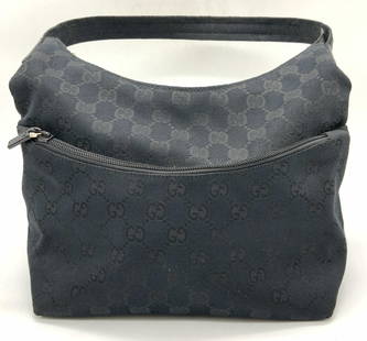 GUCCI Black GG Monogram Hobo Shoulder Bag, Italy: Classic Gucci black monogrammed fabric handbag with soft black leather handle and trim. Zippered Exterior pocket , interior zippered pouch, and signed leather label ‘GUCCI Made in Italy’ New, Neve