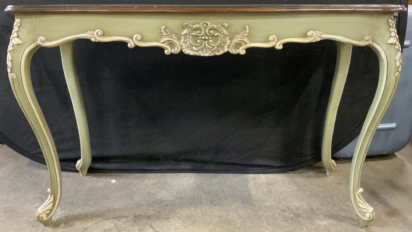 Vntg Louis XV French Country Style Wood Cnsl Table: Table is vintage possibly antique. Piece has Louis XV French Country Style. Piece is wooden. Table has brown toned wooden top w green toned wooden legs with floral, leaf, C & S curl detail. Console ta