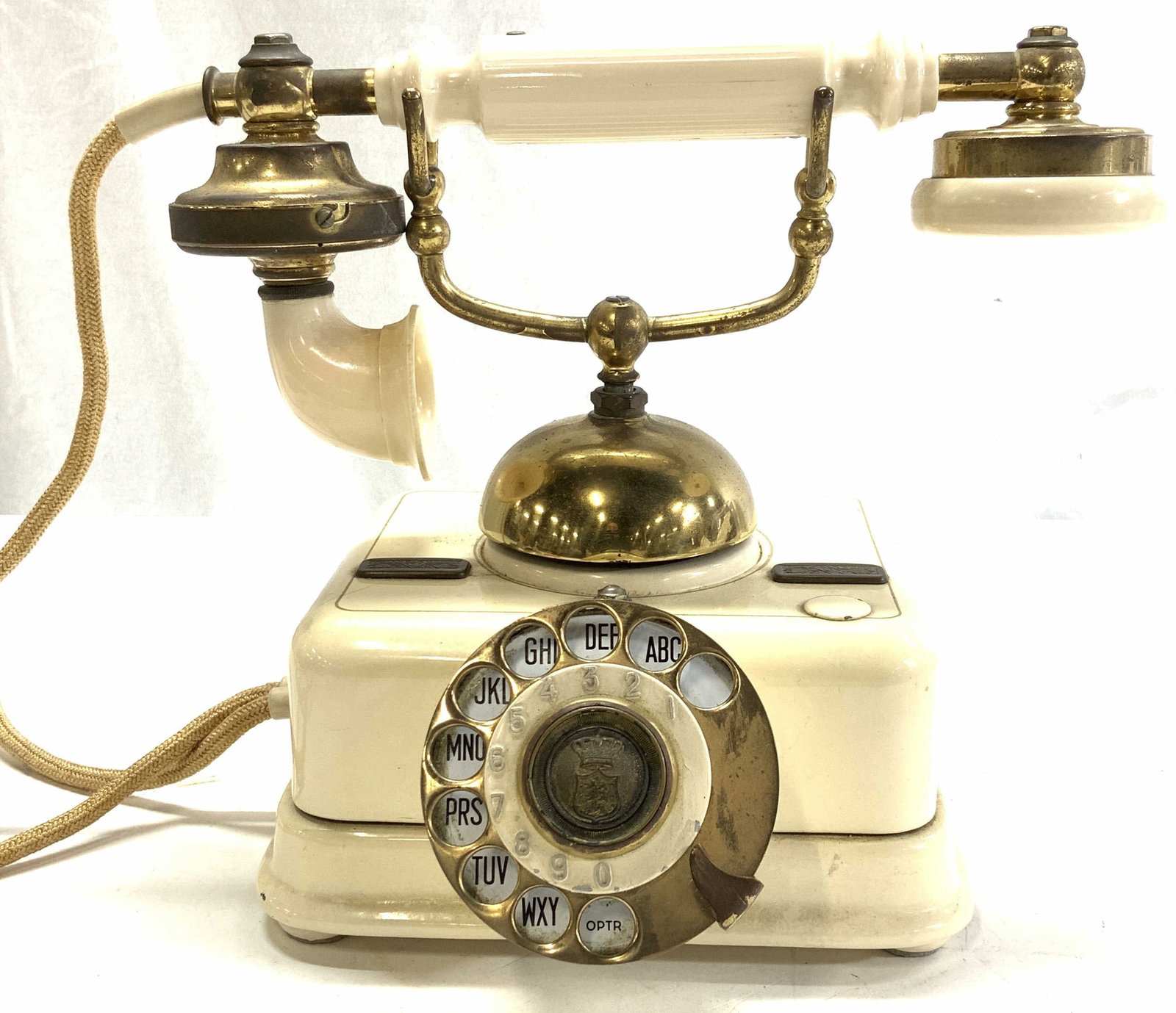 KJOBENHAVNS Danish Rotary Phone, Denmark: Danish Kjobenhavns Telefon Aktieselskab Rotary Desk Phone, ca 1940. Heavy cream coated metal and brass with oratory brass dial. Hallmarked on brass near speaker. And marked Made in Denmark on verso. H