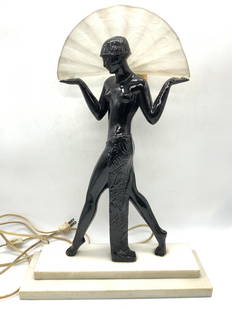 Art Deco Max Le Verrier Style Fan Dancer Lamp: Art deco dancer lamp, made with white alabaster base and figure possibly made of stone and coated in black with glass fan behind the head. Approximately 18.5 inches and 13 x 4 inches wide base. Modera