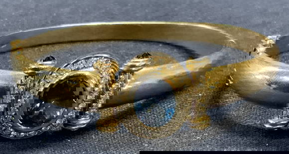 14k Gold, Diamond & Spinel Bracelet: 14k gold bracelet with blue spinel center stone and accents and diamond halo. Marked 14k, 585 to interior band. Some surface wear consistent with exposure. Measures approx. 2 1/8 inches wide, band app