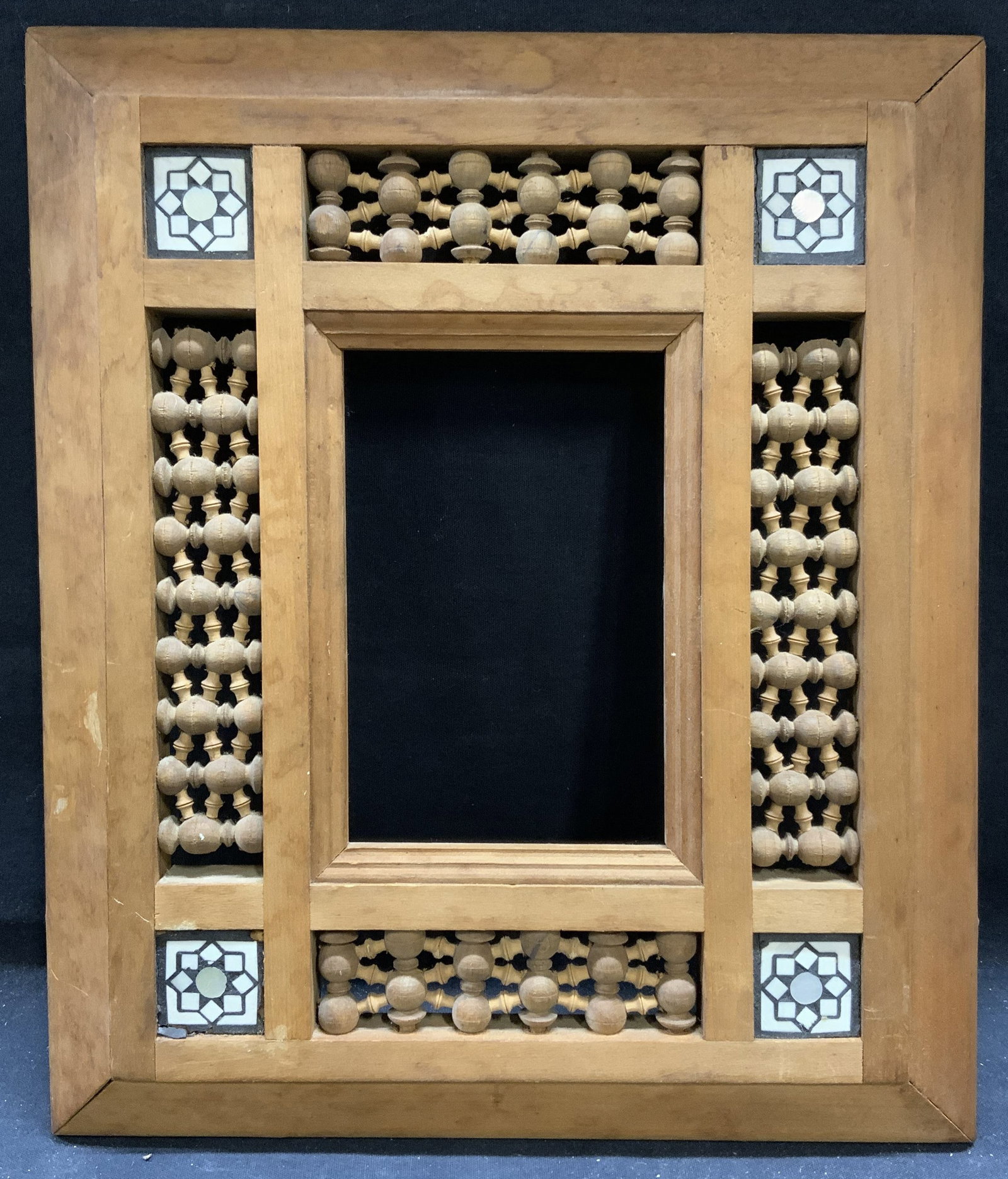 Vintage Wood Marquetry & MOP Frame: Vintage wood frame with inlaid marquetry star and mother of pearl decoration. Measures approx. 12 5/8 x 10.75 inches, window approx. 5.5 x 3 5/8 inches. Some surface wear consistent with exposure. Fra