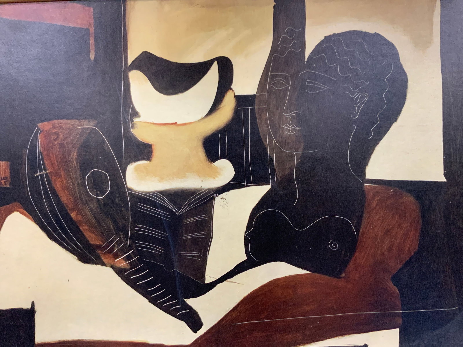Framed Picasso Antique Bust & Guitar Litho: Marked on left upper margin Picasso. Depicts a bronze bust on a table next to a guitar. Framed in gold metal leaded wooden frame with linen section with a smaller gold leafed rim around painting. Appr