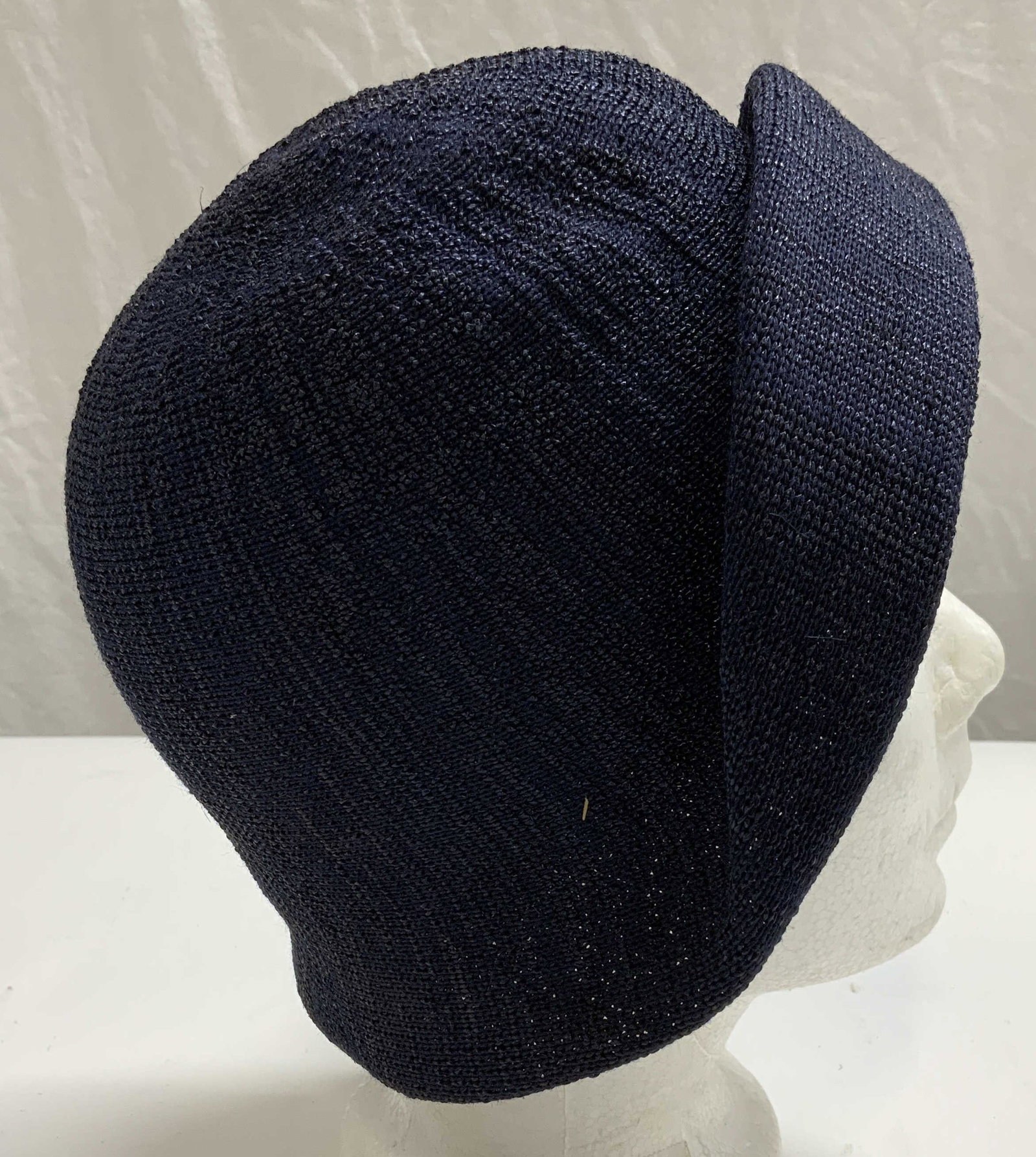 Vintage Joseph Horne Blue Knit Hat, England: Vintage Joseph Horne blue knit hat. Made in England. Material feels synthetic. Some wear to material consistent with exposure. Measures approx. 6 inches wide. Ladies vintage hat, ladies vintage fashio