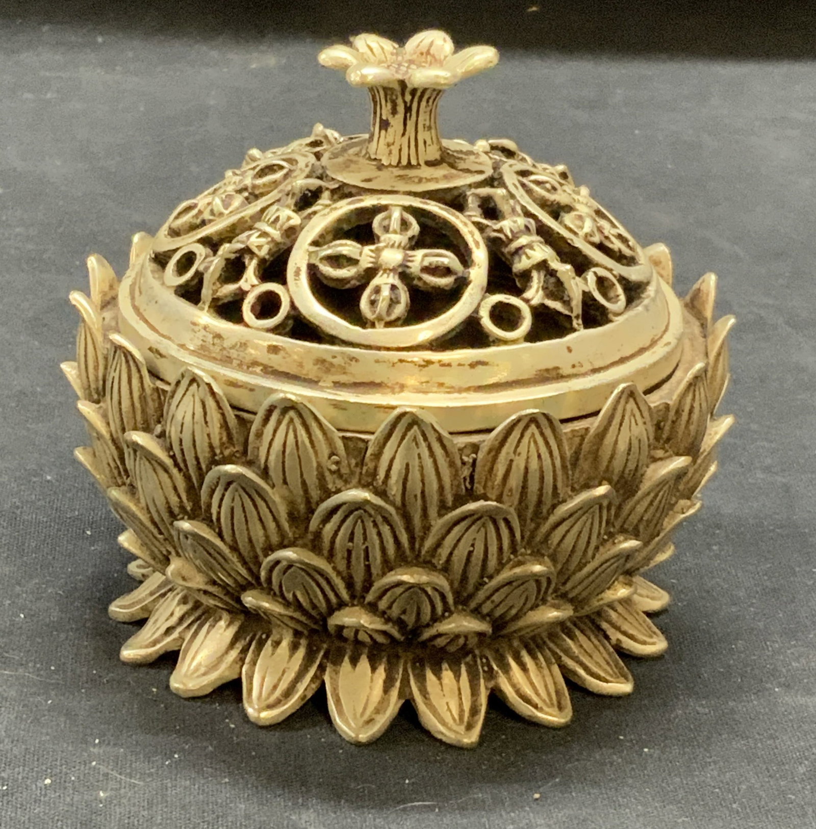 Stamped Chinese Pewter Lotus Incense Burner: Stamped Chinese pewter lotus incense burner. Stamped to underside. Some surface wear consistent with exposure. Measures approx. 4 x 3.75 inches. Chinese incense burner, Asian incense burner, pewter in