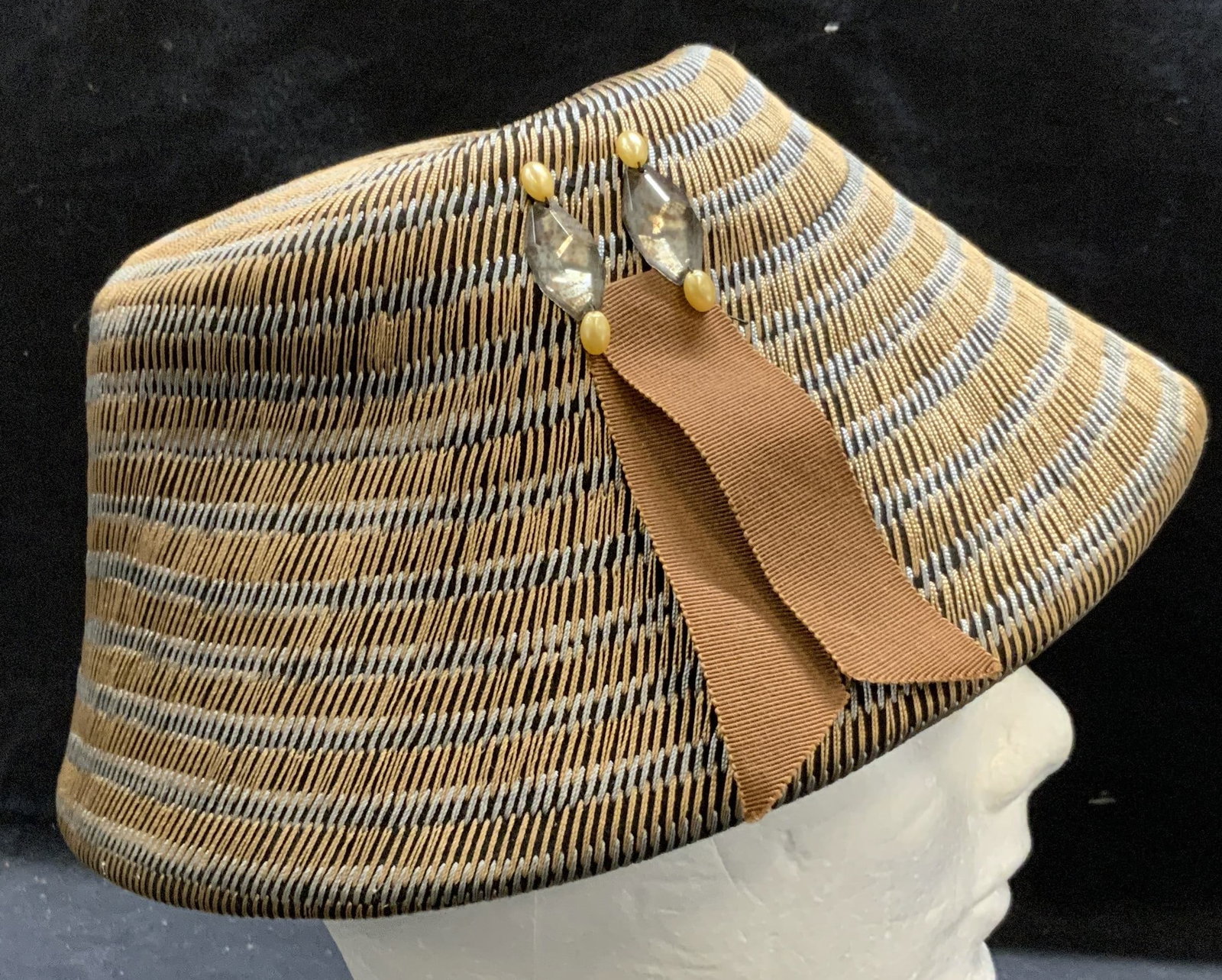 Vtg Amy New York B Altman Embroidered Hat: Vintage Amy New York B Altman & Co brown embroidered hat with ribbon and beaded decoration. Material feels synthetic. Measures approx. 6.25 inches wide, 8.75 total width. Some wear to material consist