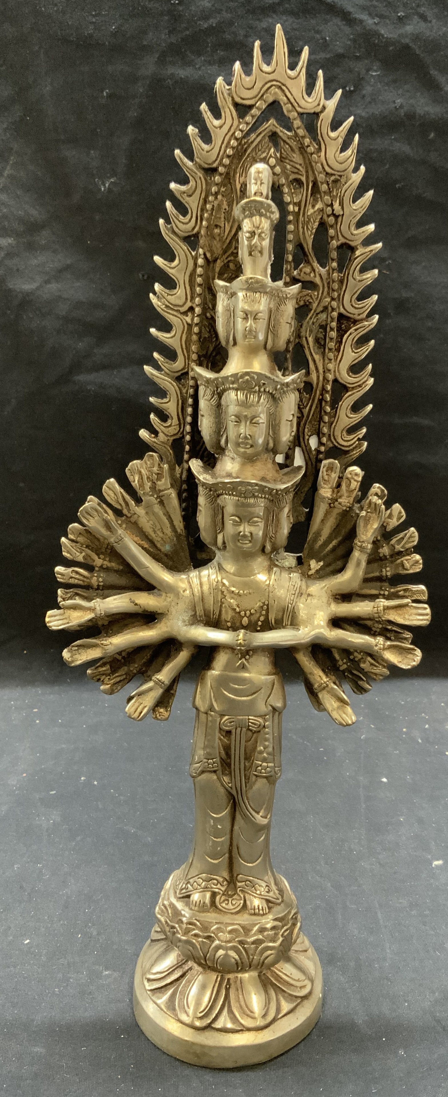 Tibetan Bodhisattva Pewter Figural: Tibetan Bodhisattva Guanyin pewter figural. Measures approx. 5.25 x 3 x 13.75 inches. Surface wear consistent with exposure. Guanyin, Bodhisattva, Buddhist figurine, Tibetan figurine, Guanyin figurine
