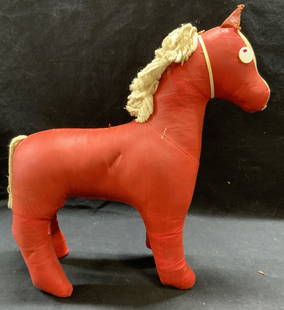 Antique Handmade Painted Fabric Horse Toy: Antique handmade red painted fabric horse toy with mother of Pearl button eyes. Some surface wear consistent with exposure. Measures approx. 10 x 3.5 x 11.25 inches. Property from F.W. WOOLWORTH CEO B