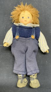 Vintage Bisque & Fabric Doll: Vintage doll. Bisque head and limbs and fabric body. Surface wear consistent with exposure. Measures approx. 9.5 inches long. Property from F.W. WOOLWORTH CEO Byron DeWitt Miller estate by family desc