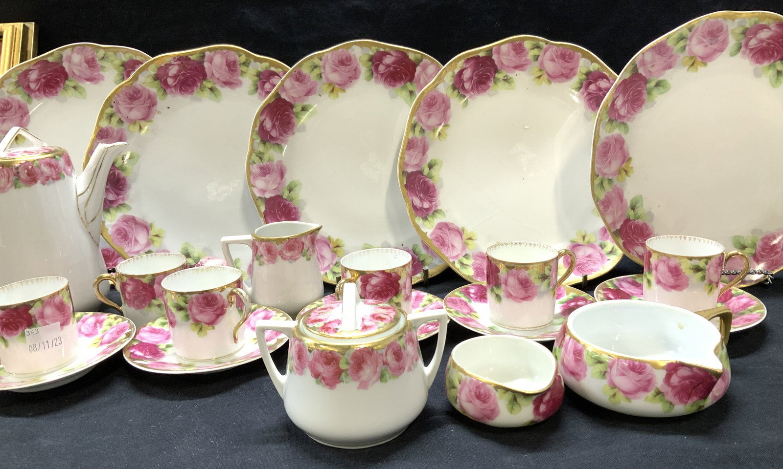 R.C. Kronach-Bavaria Porcel Demitasse Plate Set 28: P. Raddatz & Co. R.C Kronach Bavaria Chrysantheme Cacilie fine white chinaware. Demitasse cup and saucer set with serverware and luncheon plates. Hand painted pink roses, gilt handles and rims. Marked