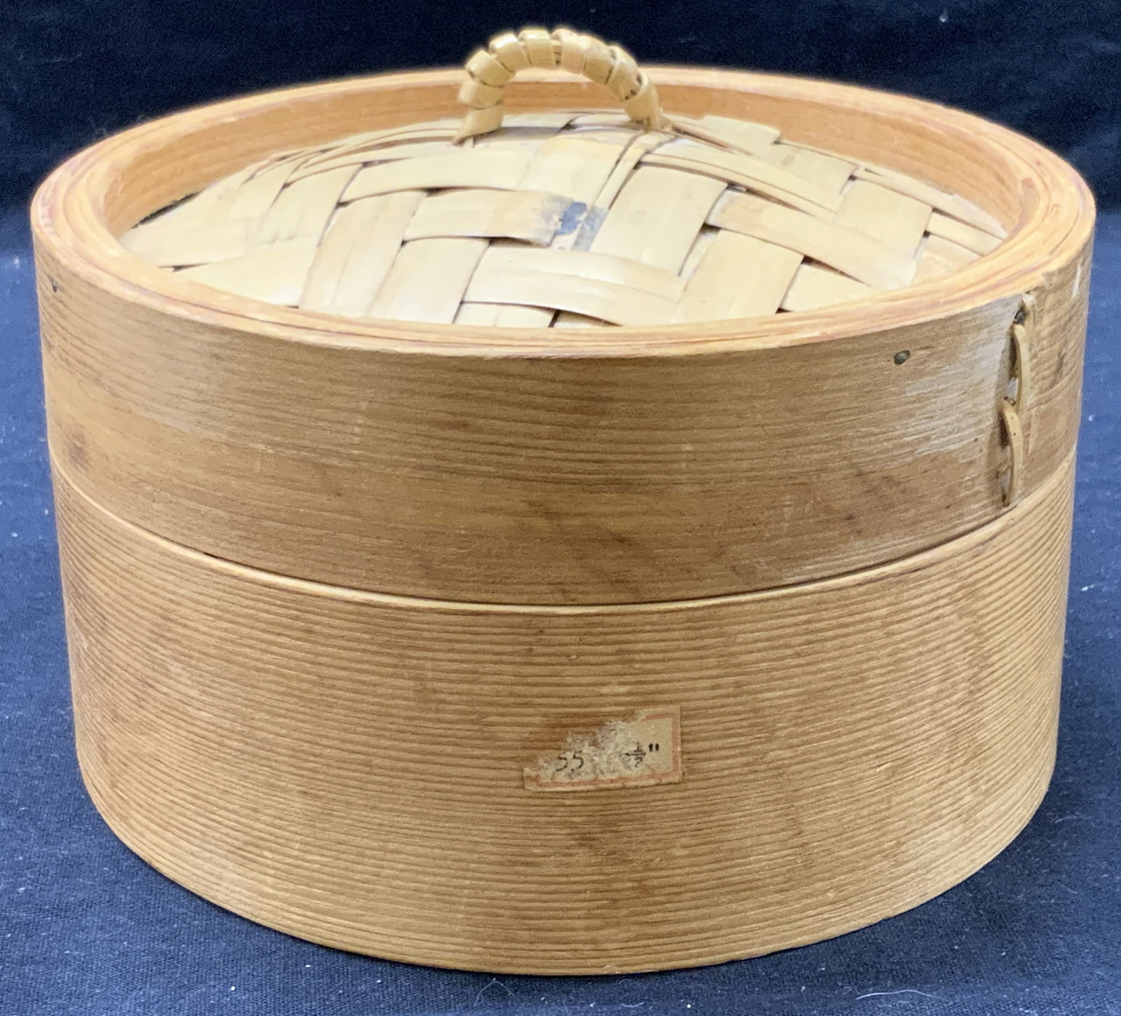Bamboo Made 4 Inch Tall Steamer: Bamboo made dumpling steamer with cross hatching on lid and open bottom. Approximately 4 inches tall and 6 inch diameter. Moderate surface wearing due to previous use. Bamboo steamer. Asians dumpling 