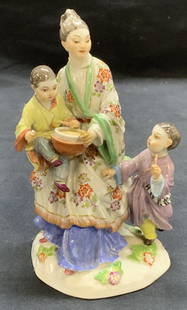 Vintage Meissen Porcelain Chinoiserie Figurine: Vintage mid century Meissen porcelain chinoiserie figurine of mother with children. Trademarked to underside. Crossed Swords hallmark, numbered 2679. Minor chipping observed on hands. Measure