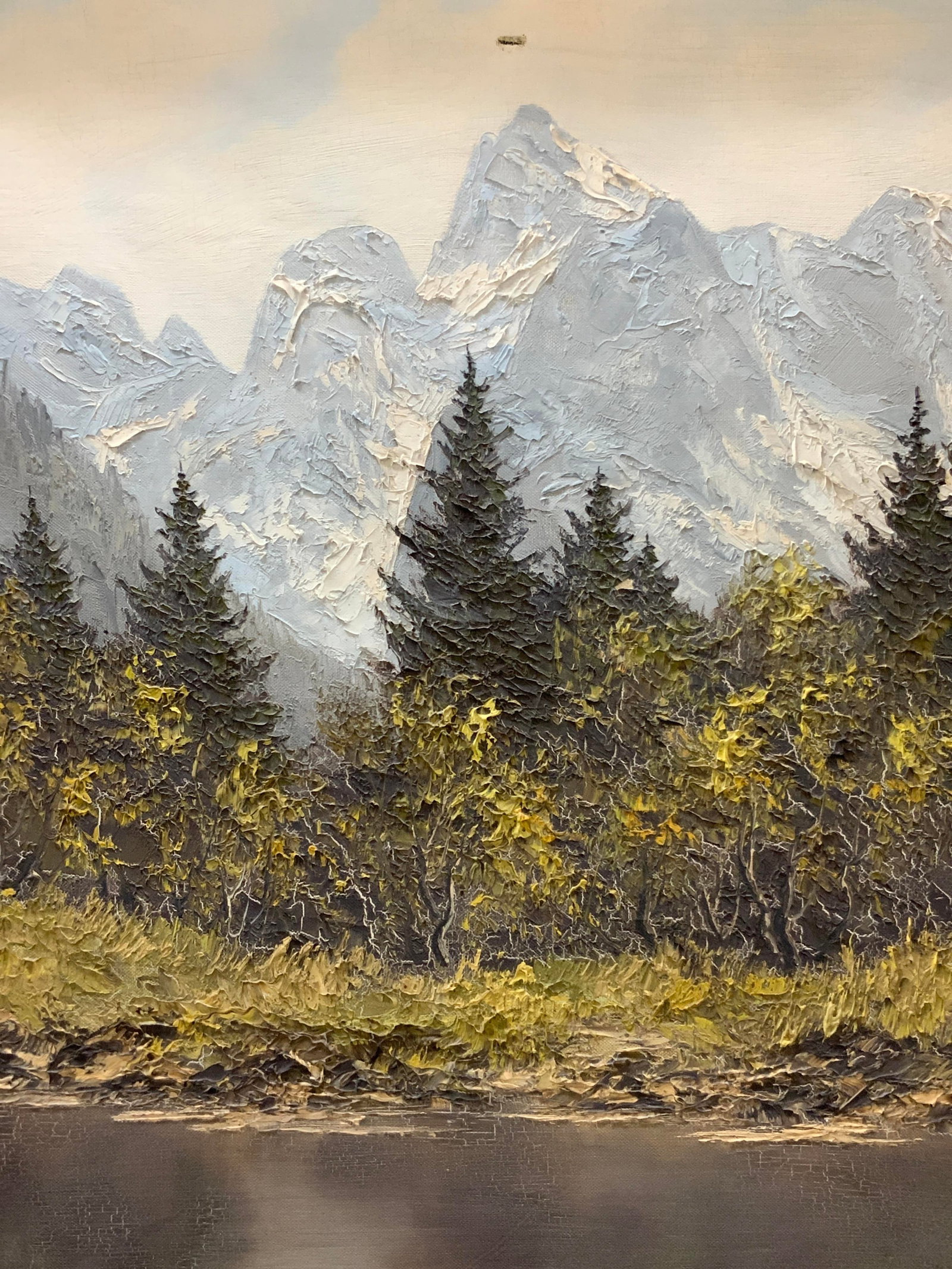 Signed Impressionist Woodland Landscape Painting: Signed on lower right corner, possibly reads Moger. Depicts a forest landscape with blue mountains overhead. Framed in ornate wooden frame with raise scroll patterns on edges. Approximately 27.5 x 23.