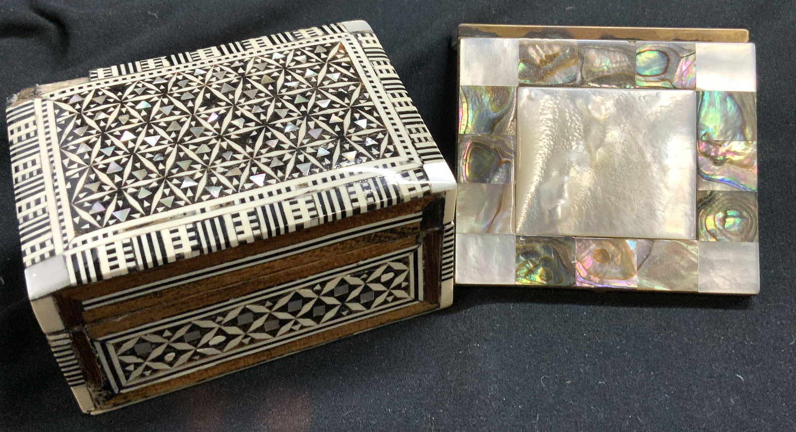 MOP/Abalone Mirror Compact, MOP Bone Wood Box: Hand crafted trinket box made in inlaid mother of Pearl and bone piece in a geometric pattern and shellacked. Interior is all red velvet, measures 3.5 x 2.5 x 1.75 in. Corner piece chipped off. Mother
