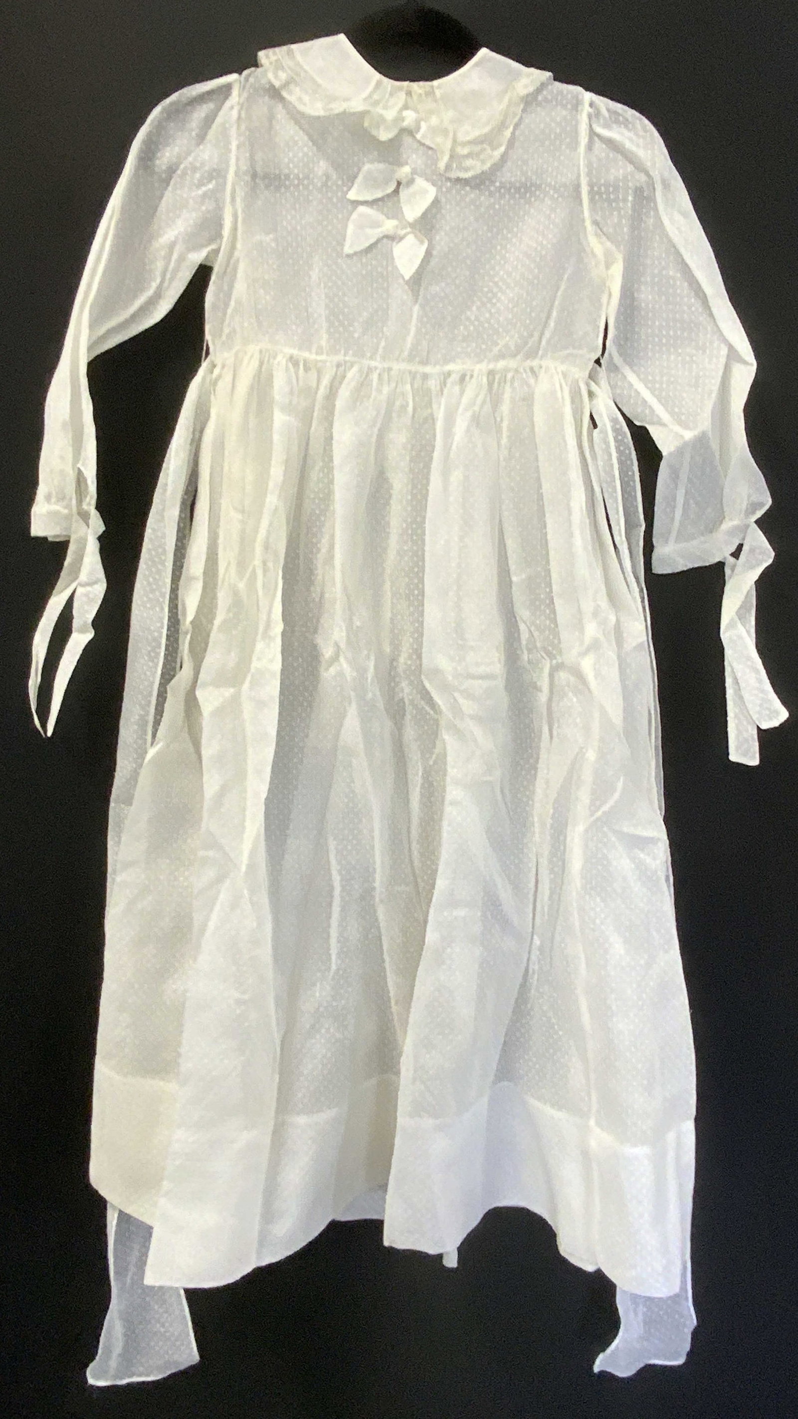 Vintage BEST & CO Childrens White Swiss Dot Dress: Vintage, possibly antique, children’s white Swiss dot dress with belt. Sheer material, feels synthetic. Designer label reads Best & Co Fifth Ave New York. Dress measures approx. 14.5 inches across c