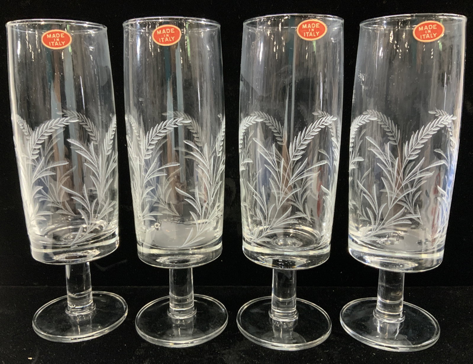 Mid Cent Etched Wheat Cocktail Glasses, 10 Italy: Hand blown glassware- Short stem flutes with etched wheat design, total 10 glasses marked Made in Italy ( original sticker label) . These come in the original styrofoam boxes. Meath measure 6.75 in. H