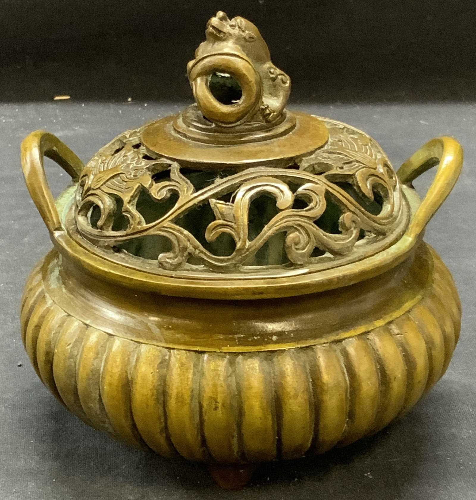 Stamped Chinese Bronze Dragon Incense Burner: Stamped Chinese bronze incense burner with dragon motif. Stamped to underside. Some surface wear consistent with exposure. Measures approx. 5.25 x 5.25 inches. Chinese incense burner, Asian incense bu