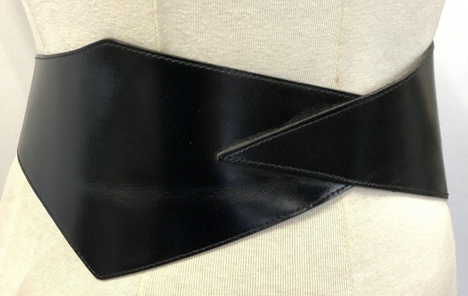 Thierry Mugler Stamped Leather Waist Belt: Marked Thierry Mugler, Medium, black toned leather made waist fashion belt with brass buckles. Approximately 32 inches long. Moderate wearing to leather due to age and use. Leather fashion Belt. Fashi