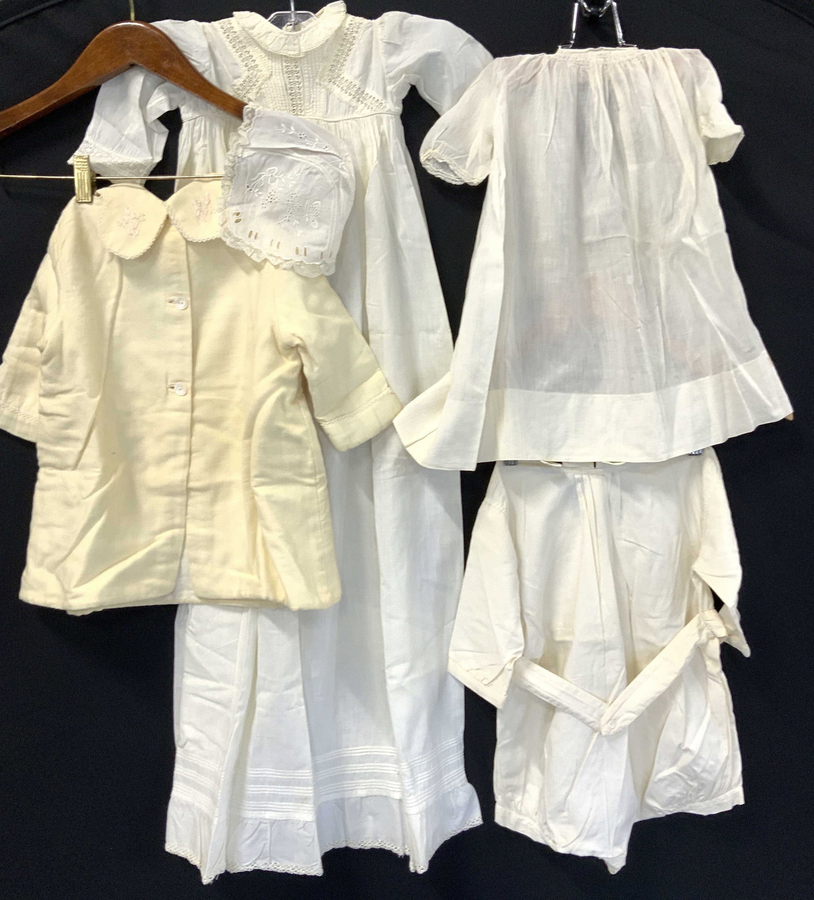 Antique Cotton Baby Child Clothes , c. 1906: Lot of baby and toddler antique clothing. Clothing is Approx c. 1906 and with general surface wear and blemishing. 1- cream cotton christening dress and christening bonnet. dress 37 in. L 1- Cream Cot