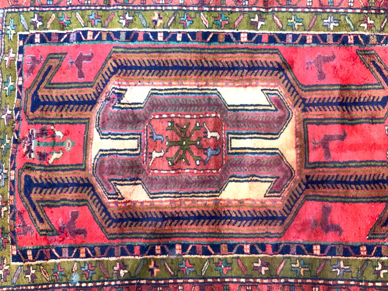 Hand Woven Turkish Pictorial Rug: Hand woven Turkish/ Persian pictorial rug with geometric patterns and bird motifs in bold colors. Approximately 133 inches long, 11ft, x 46 inches wide. Evident wearing and loss patches. Area rug, rug