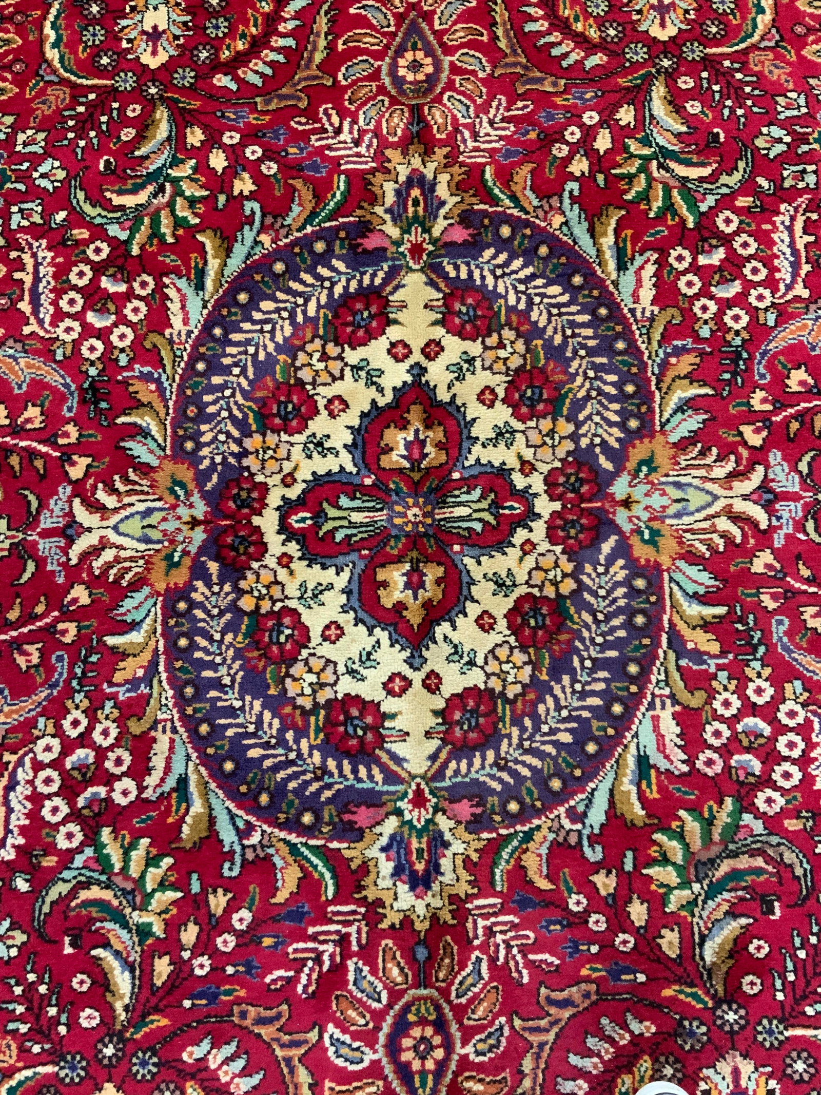 Vintage Persian Floral Fringed Rug: Vintage woven Persian/ Turkish rug with scroll floral patterns and white fringe. Approximately 117 x 79 inches. Evident wearing to corners and red blemishing to rug. Area rug, rug, Turkish rug, Persia