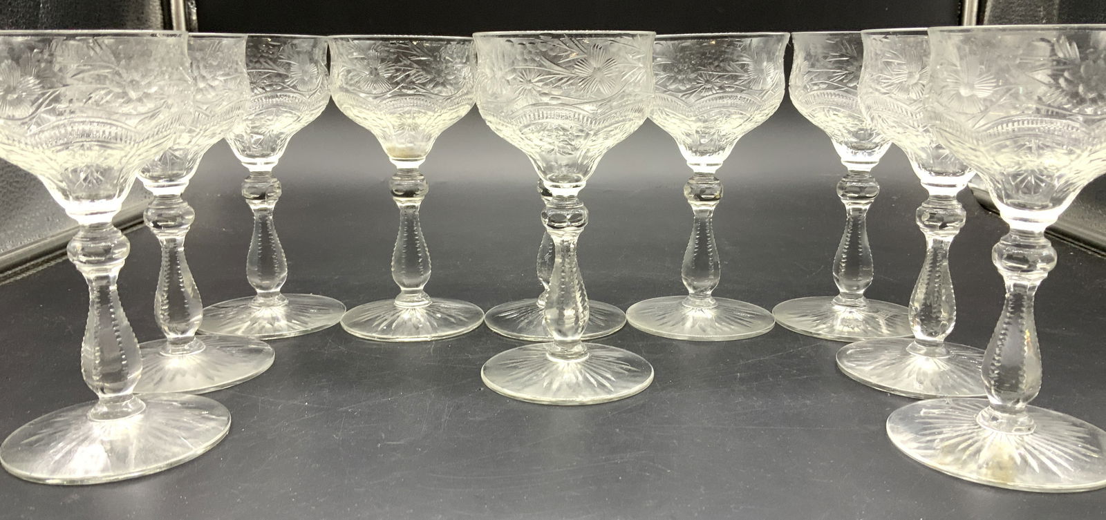 Set 10 Vtg Etched Wheat Design Crystal Stemware: Etched crystal and cut crystal stemware with 2.5 x 1.75 in. goblets that has flower and wheat designs. Cut Crystal stem, glasses 5 in ht. 1 glass has a rim chip. Vintage Crystal stemware, Vintage cut