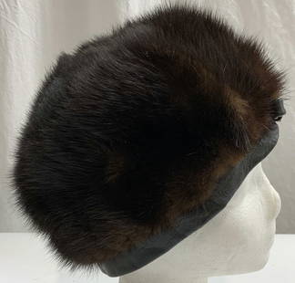 Vintage Macys Brown Fur Hat: Vintage Macys brown fur and leather trim hat. Possibly mink. Some surface wear consistent with exposure. Measures approx. 6.25 inches wide. Macys, Macys hat, ladies designer hat, ladies designer acces