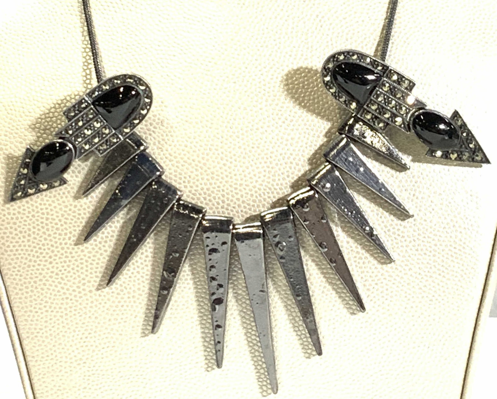 Lot2 STE Art Deco Sterling Silver Earrings, More: Signed STE Sterling Silver Art Deco earrings with Marcasite and onyx cabochons, 2 in. L, omega backs. .53 ozt total weight. Gunmetal spike necklace on snake chain, 16 in. Avant Guard Spike Necklace , 
