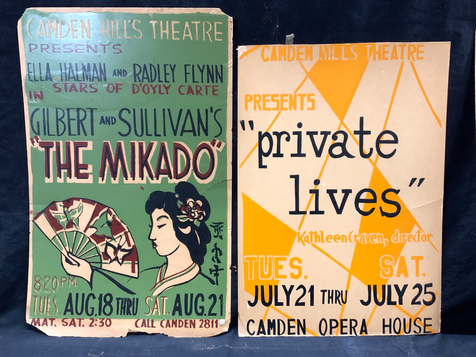 2 Camden Hills Theatre Show Signs: Set of 2 show signs from the Camden Hills Theater. 1 reads The Mikado with an an image of a geisha in green tones. 22 x 14 inches The other reads Private Lives, Camden Opera House in yellow. Approxima