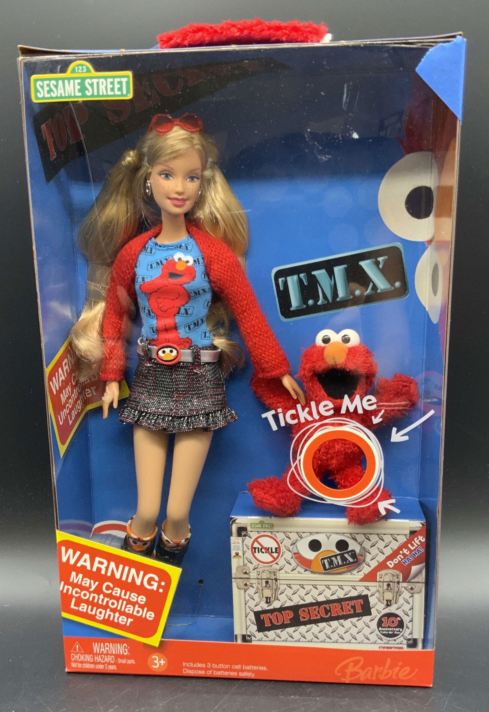 2006 BARBIE Tickle Me Elmo, Original Packaging: 2006 Barbie Tickle Me Elmo Doll by Mattel in original packaging. Comes with Barbie & Elmo and a toy purse. Measures approx. 13H x 8W in. Box appears to have been opened, some items loose in box. Some