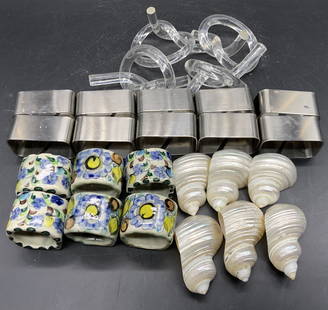 Group Lot Napkin Rings, Signed & More: A group lot of napkin rings crafted from shell, stainless steel, ceramic, and acrylic materials. Ceramic pieces are hand painted and signed, illegible. Stainless steel pieces are marked STAINLESS STEE