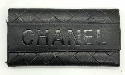 Chanel Style Black Leather Wallet: Chanel style black leather wallet. Piece has not been authenticated. Some wear consistent with exposure. Measures approx. 7 1/8 x 3 5/8 inches. Chanel style, chanel style wallet, ladies wallet, ladies