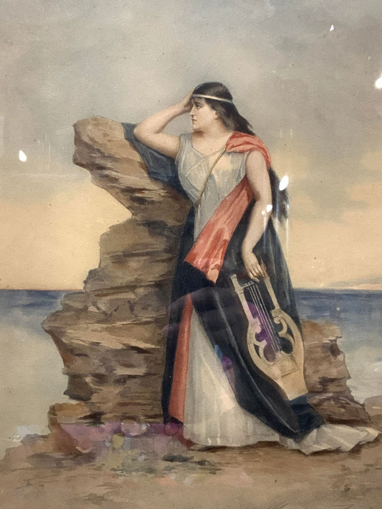 Antique Classical Muse W Lyre Lithograph: Marked copyright 1897 by D.Appleton & Co. Depicts a black haired woman, a muse, standing near a rock face in white and blue robes holding a Lyre to her side. Framed in ornate braid designs silver leaf