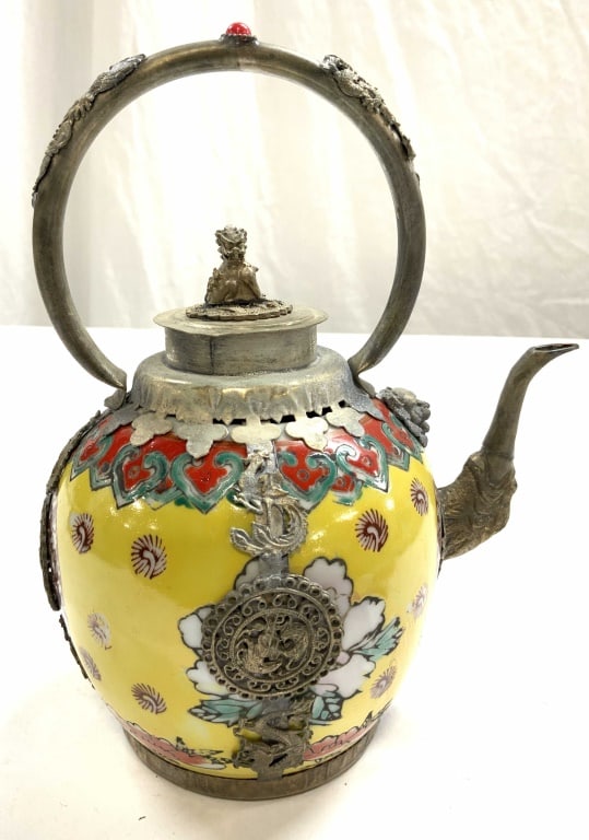 Vintage Tibetan Porc, Metal Teapot w Animal Finial: Teapot is vintage. Piece is metal & porcelain. Teapot appears to be hand painted. Teapot is lidded with foo dog finial. Piece measures approx 7.5 inches tall 6.25 inches 4.5 inches wide. Teapot, vinta