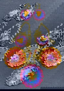 Pair TARINA TARANTINO Floral Necklace & Earrings: TARINA Tarantino matching necklace and earrings set. Orange and purple toned floral pendants with Swarovski crystal decoration. Earrings have clip on backings. All jewelry pieces have designed label t