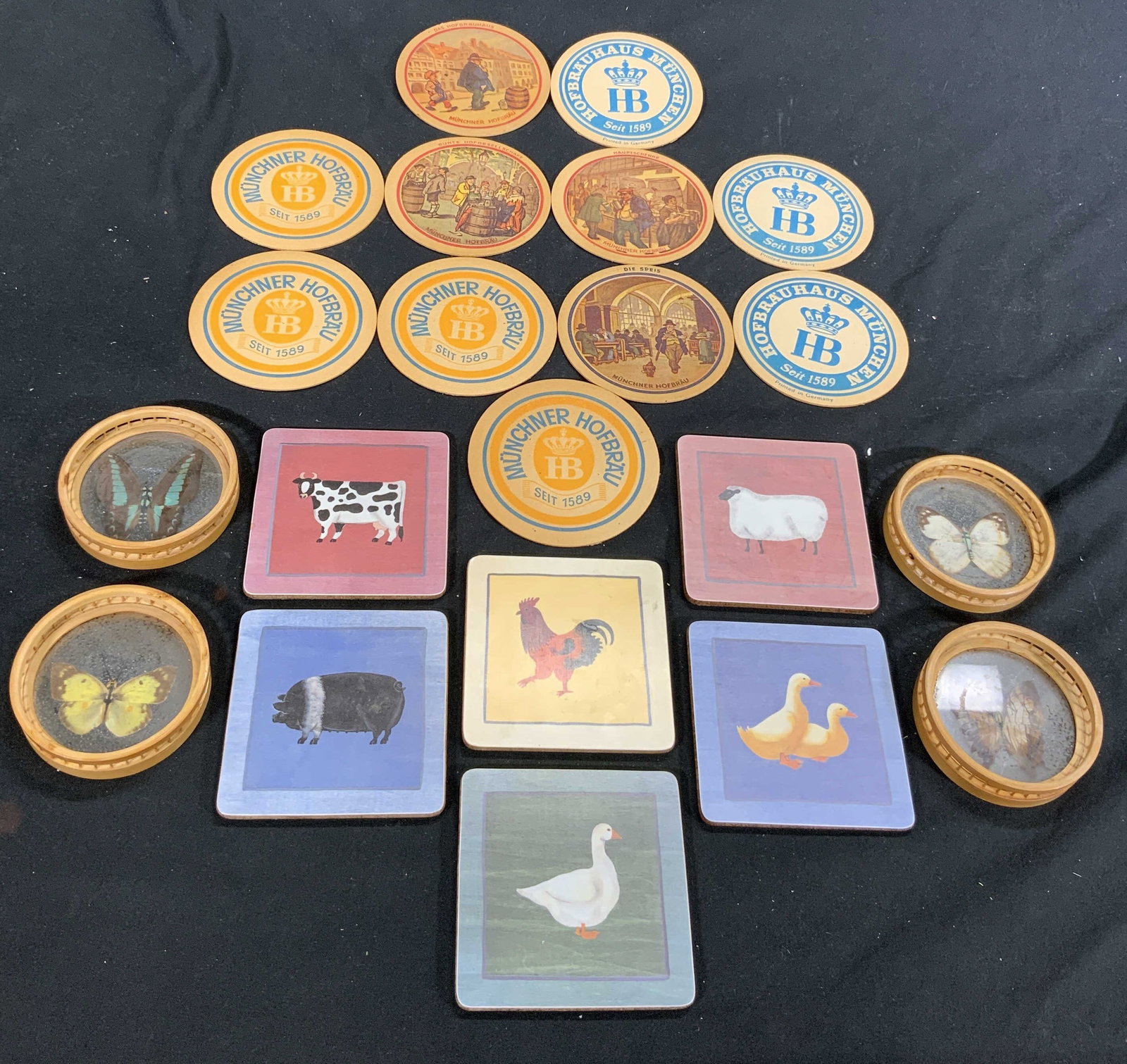Lot 21 Vtg Assorted HOFBRAU Coasters & More: Lot includes 11 HOFBRAU Coasters. 6 ROSEMARY JANE Coasters, & 4 butterfly coasters. Square shaped coasters have animal detail & measure approximately 4 inches square. Coasters, assorted coasters, butt