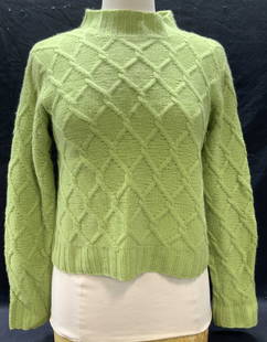 Green Cable Knit Cashmere Sweater: Green cable knit cashmere sweater. Measures approx. 18 inches across chest. Some wear to material consistent with exposure. Ladies sweater, ladies cashmere sweater, ladies green sweater, ladies cable